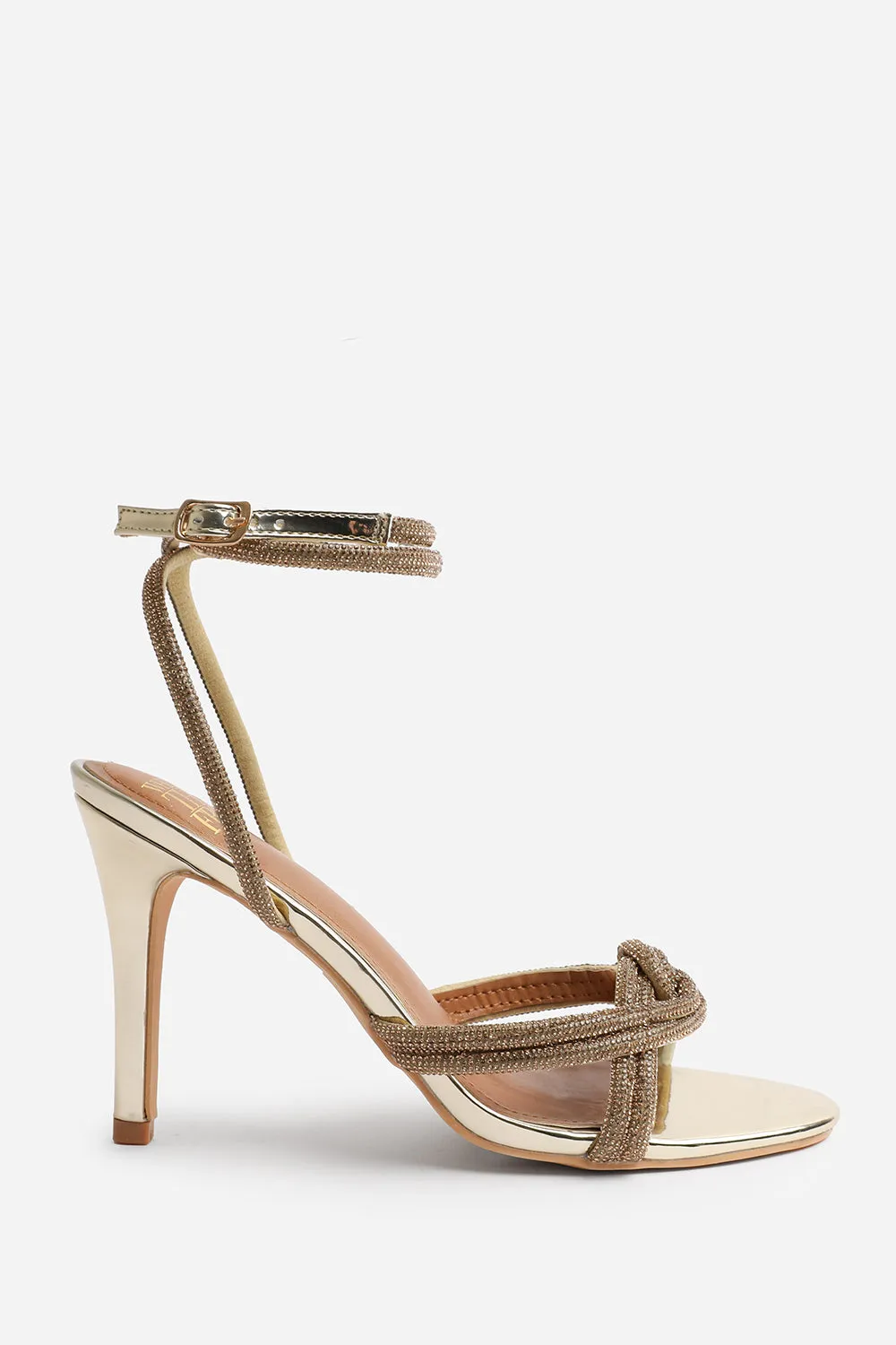 MADON DIAMANTE KNOT DETAIL WITH CROSS OVER ANKLE STRAP HIGH HEELS IN GOLD CHROME